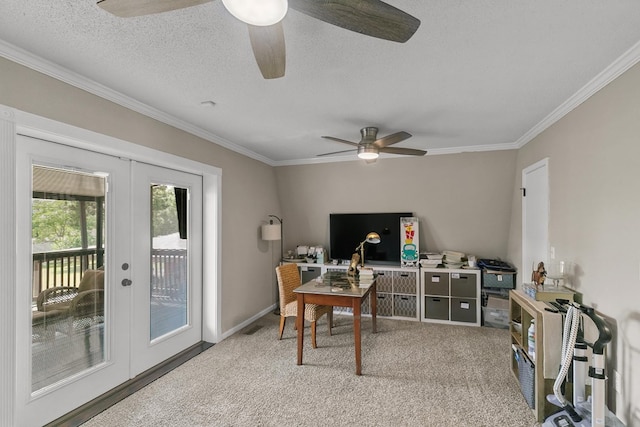 home office with ornamental molding, light carpet, a textured ceiling, french doors, and a ceiling fan