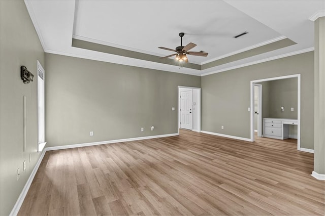 133 Brockton Ct, Dothan, AL 36305 - unfurnished bedroom with a raised ceiling, crown molding, light wood finished floors, and a ceiling fan