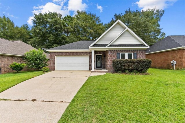 133 Brockton Ct, Dothan, AL 36305 - view of front of property featuring a garage, concrete driveway, a front yard, and brick siding