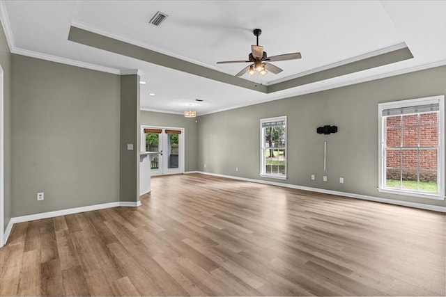 133 Brockton Ct, Dothan, AL 36305 - unfurnished room with a raised ceiling, ornamental molding, plenty of natural light, wood finished floors, and recessed lighting