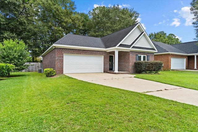 133 Brockton Ct, Dothan, AL 36305 - view of front facade with a garage, driveway, and brick siding