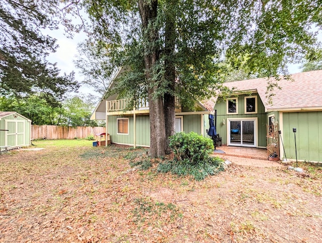 exterior space featuring a shed