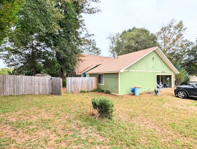 view of home's exterior featuring a yard