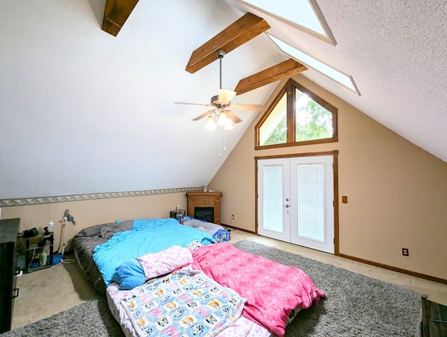 carpeted bedroom featuring vaulted ceiling with beams, ceiling fan, and a textured ceiling