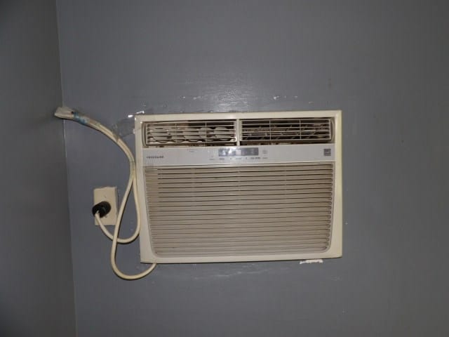 details with a wall mounted AC