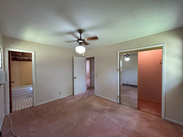 1000 Martin St, Dothan, AL 36301 - unfurnished bedroom featuring carpet floors, baseboards, ceiling fan, and ensuite bath