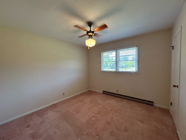 1000 Martin St, Dothan, AL 36301 - spare room featuring baseboards, a ceiling fan, a baseboard heating unit, and light carpet