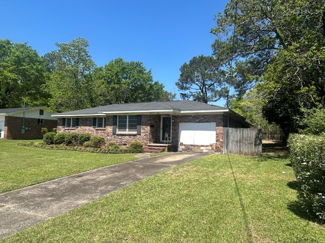 1000 Martin St, Dothan, AL 36301 - ranch-style house featuring fence, a front lawn, brick siding, a garage, and driveway