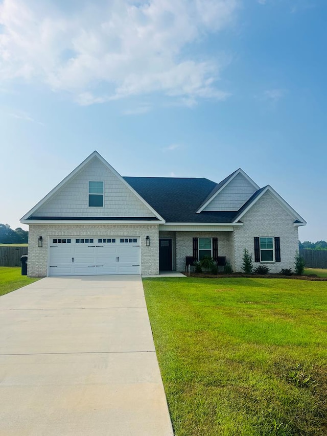 ranch-style house with a garage and a front yard