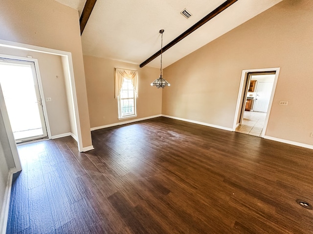 unfurnished dining area with a chandelier, visible vents, beamed ceiling, high vaulted ceiling, and wood finished floors