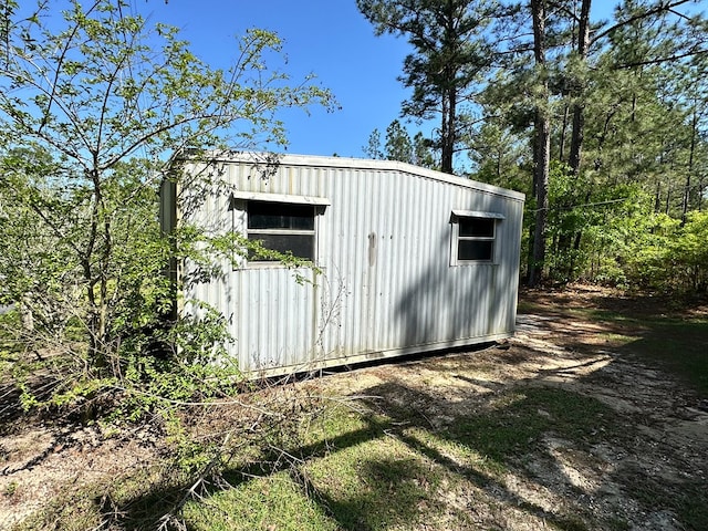 view of outbuilding featuring an outdoor structure