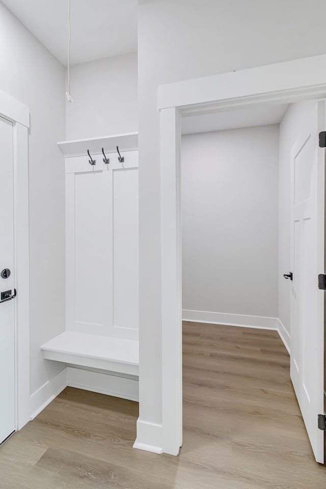 mudroom with light wood-type flooring