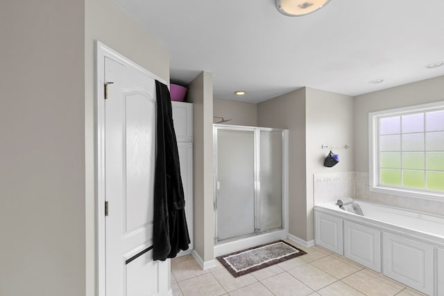 6 Piedmont Pl, Enterprise, AL 36330 - bathroom with a shower stall, a garden tub, and tile patterned flooring