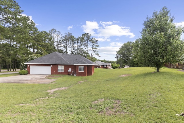 6 Piedmont Pl, Enterprise, AL 36330 - view of front facade featuring driveway, an attached garage, and a front yard