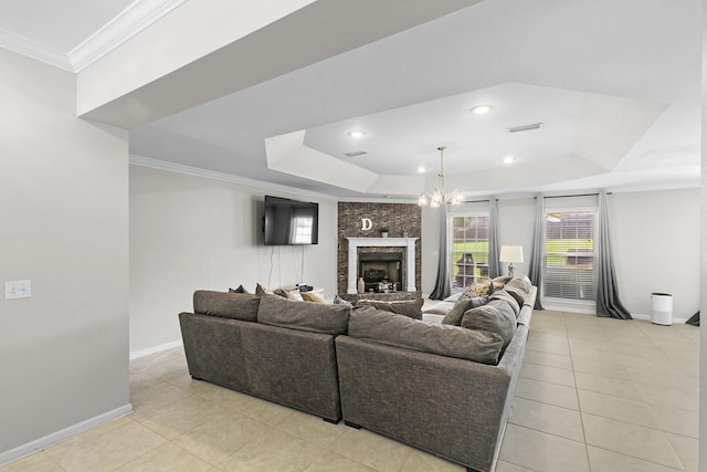 6 Piedmont Pl, Enterprise, AL 36330 - living area featuring a raised ceiling, ornamental molding, light tile patterned floors, a fireplace, and recessed lighting