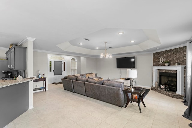6 Piedmont Pl, Enterprise, AL 36330 - living area featuring a tray ceiling, ornamental molding, a fireplace, recessed lighting, and light tile patterned floors