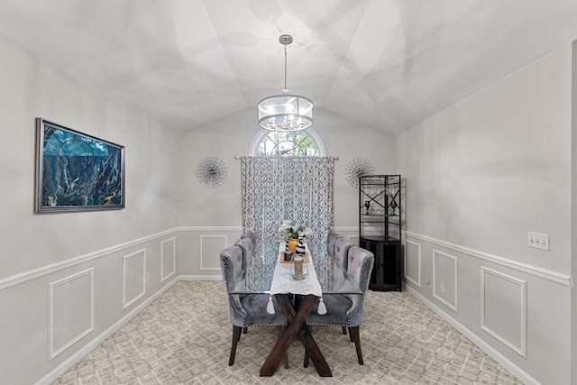 6 Piedmont Pl, Enterprise, AL 36330 - dining space with a decorative wall, a chandelier, a wainscoted wall, carpet flooring, and vaulted ceiling