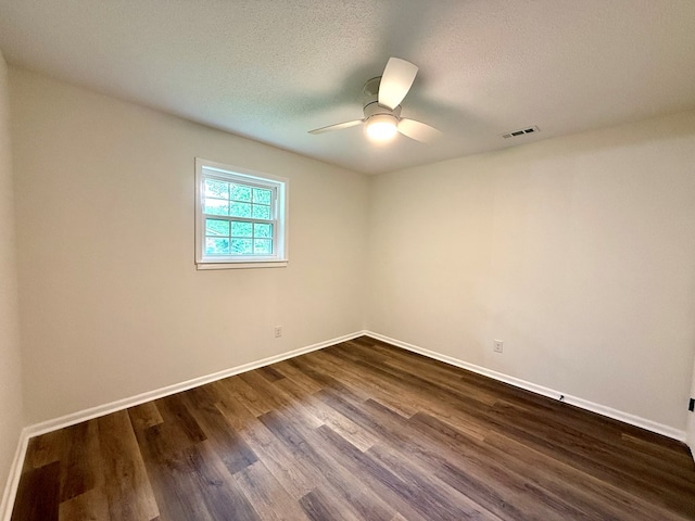 143 Durby Ln, Dothan, AL 36305 - empty room with dark wood finished floors, a ceiling fan, and a textured ceiling