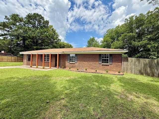 143 Durby Ln, Dothan, AL 36305 - ranch-style home featuring brick siding and a patio
