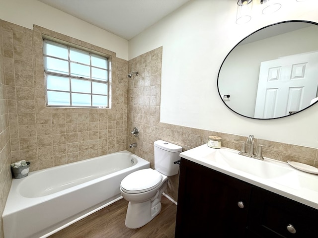 143 Durby Ln, Dothan, AL 36305 - full bathroom featuring vanity, wood finished floors, shower / tub combination, and tile walls