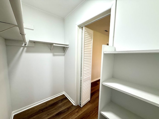 143 Durby Ln, Dothan, AL 36305 - walk in closet with dark wood-type flooring