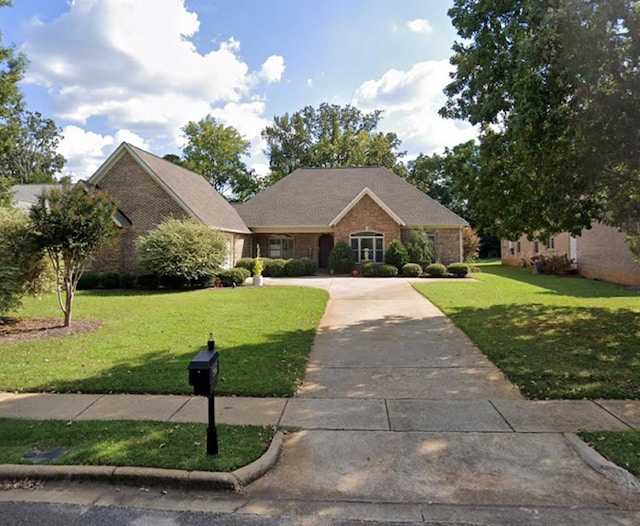 view of front of home with a front yard