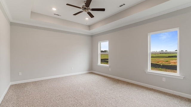 330 Heritage Way, Headland, AL 36345 - spare room featuring a tray ceiling, visible vents, and baseboards