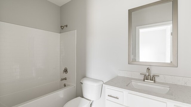 330 Heritage Way, Headland, AL 36345 - bathroom featuring toilet, washtub / shower combination, and vanity