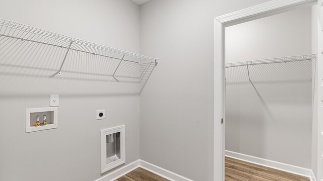 330 Heritage Way, Headland, AL 36345 - laundry room with washer hookup, laundry area, hookup for an electric dryer, and wood finished floors