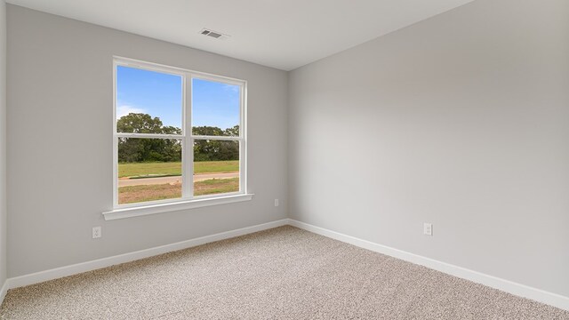 330 Heritage Way, Headland, AL 36345 - carpeted empty room with visible vents and baseboards