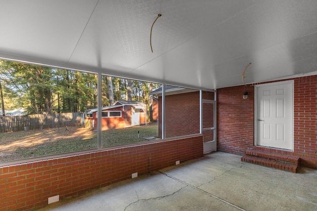 unfurnished sunroom with entry steps