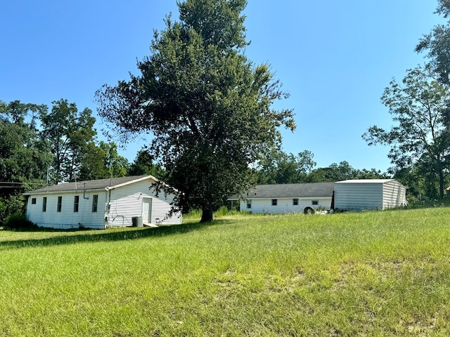 811 Maude Ave, Opp, AL 36467 - view of green lawn featuring an outdoor structure