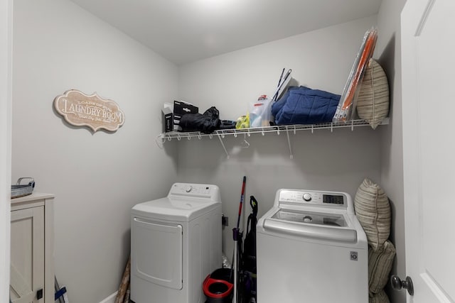 laundry area with washer and clothes dryer