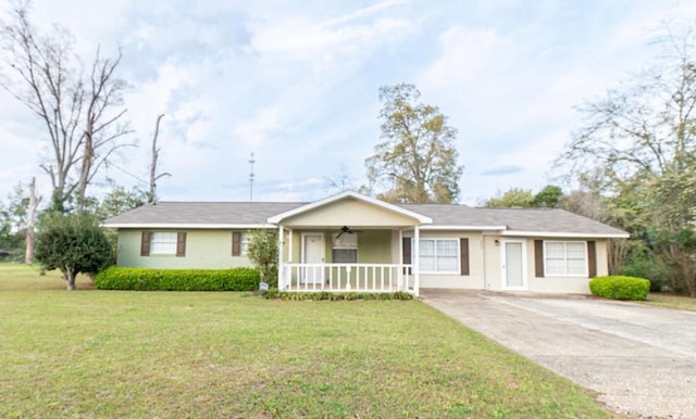 ranch-style home with covered porch, concrete driveway, a front lawn, and stucco siding