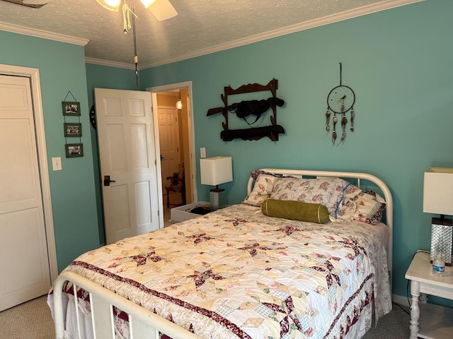 carpeted bedroom with ceiling fan, ornamental molding, and a textured ceiling