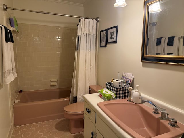 full bathroom featuring vanity, shower / tub combo with curtain, tile patterned floors, and toilet