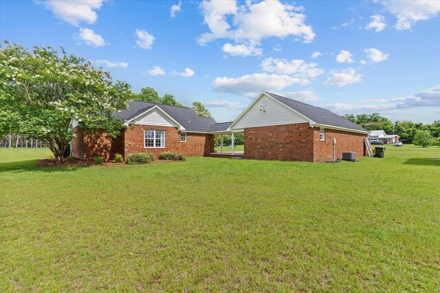 493 Shiloh Rd, Hartford, AL 36344 - back of property with a yard and brick siding