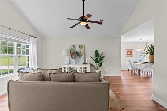 493 Shiloh Rd, Hartford, AL 36344 - living room with ceiling fan, dark wood-style flooring, a chandelier, and high vaulted ceiling