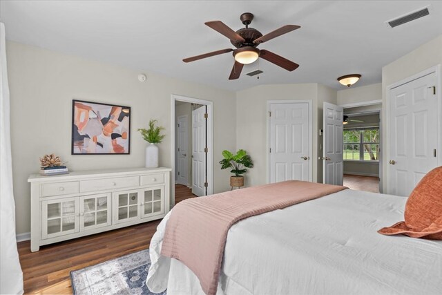 493 Shiloh Rd, Hartford, AL 36344 - bedroom with wood finished floors, ensuite bath, and ceiling fan