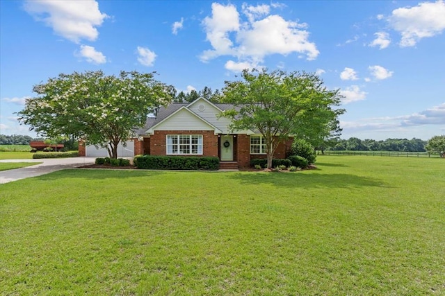 493 Shiloh Rd, Hartford, AL 36344 - view of front of house with concrete driveway, a front yard, brick siding, and an attached garage