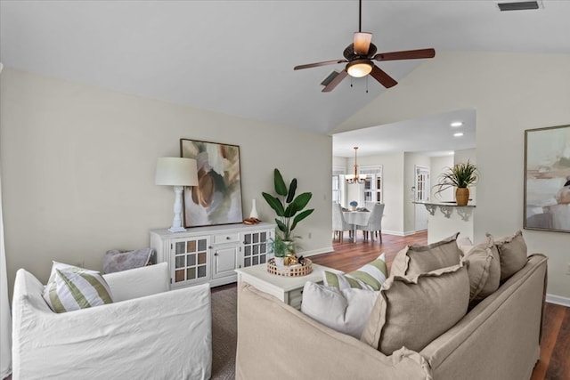 493 Shiloh Rd, Hartford, AL 36344 - living room featuring a chandelier, dark wood finished floors, a ceiling fan, and high vaulted ceiling