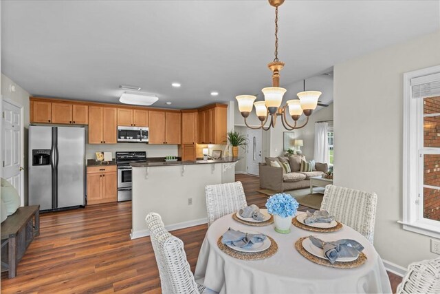 493 Shiloh Rd, Hartford, AL 36344 - dining area featuring a chandelier, dark wood-type flooring, and recessed lighting