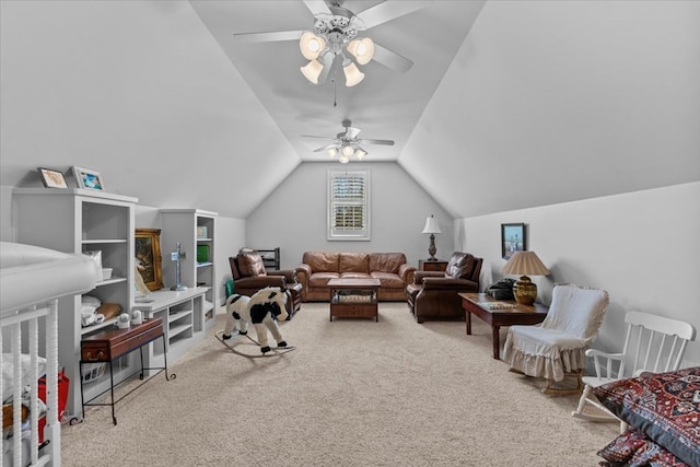 interior space featuring carpet floors, lofted ceiling, and ceiling fan