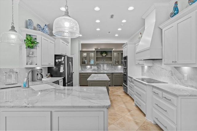 kitchen featuring black electric cooktop, premium range hood, a sink, freestanding refrigerator, and open shelves