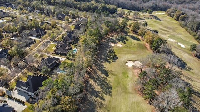 drone / aerial view featuring a residential view and view of golf course