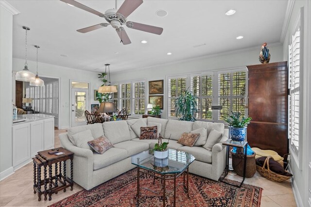 living room featuring ornamental molding, recessed lighting, light tile patterned flooring, and a ceiling fan