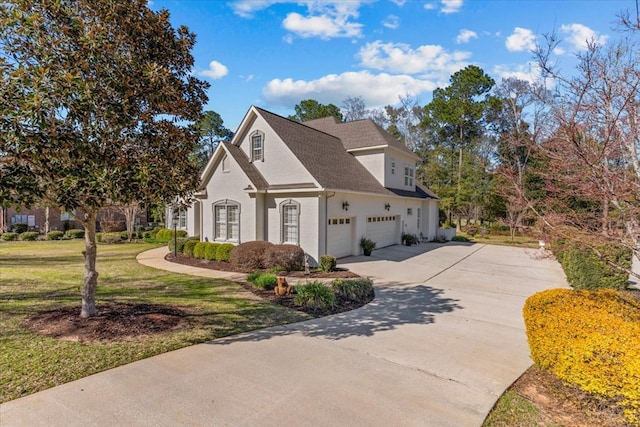 view of home's exterior with a garage, concrete driveway, and a lawn