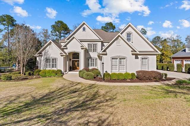 view of front of property with a front lawn