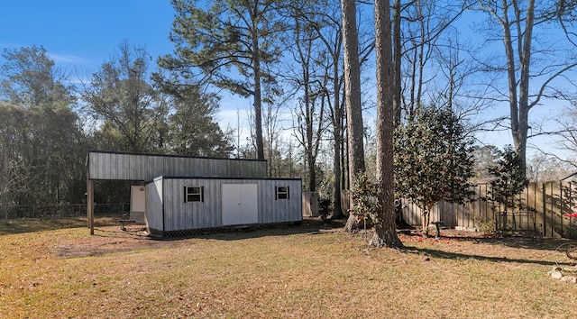 view of shed with fence