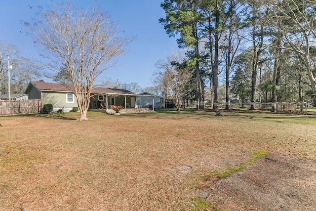 view of yard with fence